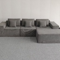 Canapé modulable en velours en forme de L de style italien, garnissage en mousse à mémoire de forme haute densité, design minimaliste pour