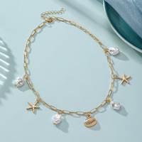 Collier multi-rangs pour femme en alliage, avec étoile de mer, coquillage, résine et perles d'imitation, design coquille de perle, très vendu