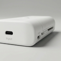 Chargeur de voyage portable UniCell C, fonctionne parfaitement pour charger les piles AA NiMH ou Li-ion 14500