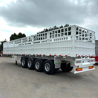 Semi-remorque à 4 essieux avec clôture haute, parois latérales en acier renforcé, pour le transport de matériaux de construction et de marchandises en vrac