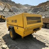 Compresseur d'air à vis diesel Atlas Copco XAS 125 d'occasion, moteur CAT, 7 bars, 6,5 m/min, portable, refroidi par eau, pour l'exploitation minière et la construction