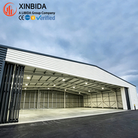 Hangar d'avion en structure métallique préfabriquée résistant au vent, entrepôt personnalisable, bâtiment préfabriqué à grande portée