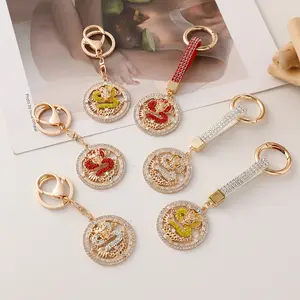 China Dragon Chinese New Year Dragon Head Keying 2024 Gold Lucky Metal Dragon Totem Keychain For Children Gift