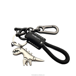 Porte-clés mignons en forme de dinosaure en gros, pendentifs pour sacs de costume d'académie de magie, breloques pour clés de voiture, cadeaux de remise de diplôme, style tendance - Product Image 5