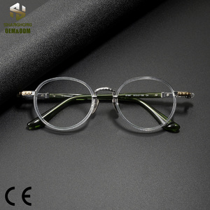 81087 Montatura <span class=keywords><strong>Occhiali</strong></span> Rotonda Minimalista Vintage <span class=keywords><strong>John</strong></span> <span class=keywords><strong>Lennon</strong></span>, Telaio Ibrido in Acetato e Titanio, <span class=keywords><strong>Occhiali</strong></span> Unisex Retrò con Aste Verdi - Product Image 1