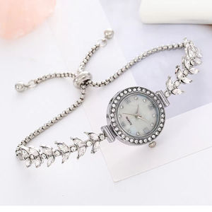 Reloj de pulsera delgado para mujer Reloj redondo de cuarzo de lujo con diseño de diamantes de imitación - Product Image 1