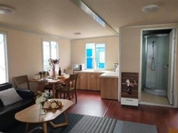 Kit de maison préfabriquée extensible avec panneau sandwich, design de villa moderne, structure en acier, tailles personnalisables