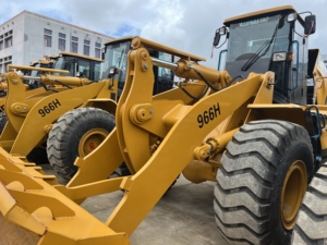 รถตัก CAT 966H มือสอง ขนาด 6 ตัน ผ่านการตรวจสอบและทดสอบแล้ว บูมอาร์มสำหรับงานหนัก ระบบไฮดรอลิกที่มั่นคง - Product Image 1