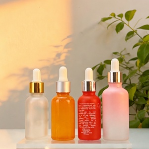 Envase de Vidrio Esmerilado Transparente para Cosméticos con Gotero Dorado, Botella de Vidrio Redonda de 50 ml con Gotero para Aceite Facial - Product Image 1