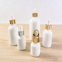 Bouteilles d'huile essentielle en céramique cosmétique en verre opale personnalisées de 30 ml, flacon compte-gouttes en porcelaine blanche de 30 ml