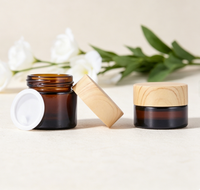 Pot en verre transparent ambré noir personnalisé avec logo OEM, vide, 5g-100g, pour crème visage, sérum, emballage cadeau cosmétique de luxe.
