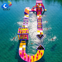 Parc aquatique gonflable modulaire coloré, jeu d'obstacles aquatiques portable pour le camping, la plage et les fêtes d'été