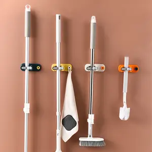 Supporto per scopa personalizzato senza punzonatura cucina installazione di perforazione multifunzionale supporto per scopa a parete Clip per Mop da bagno in plastica