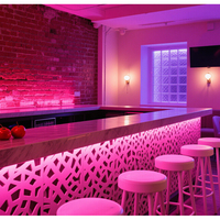 Comptoir de bar en pierre solide sur mesure avec éclairage LED translucide pour usage commercial en boîte de nuit