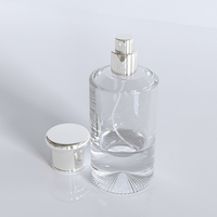 Flacon de parfum en verre vide de 100 ml de qualité supérieure, couleur dégradée personnalisée, fond épais avec base volcanique pour l'emballage de parfums