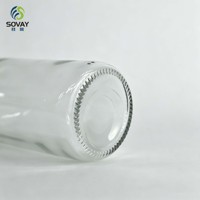 Bouteille en verre décorative transparente gaufrée vide de 330 ml, idéale pour l'embouteillage commercial et la présentation de marques en format cadeau