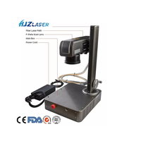 Machine laser à fibre 100W JPT MOPA avec capacité de gravure profonde 2.5D marquant le ruban d'or en métal
