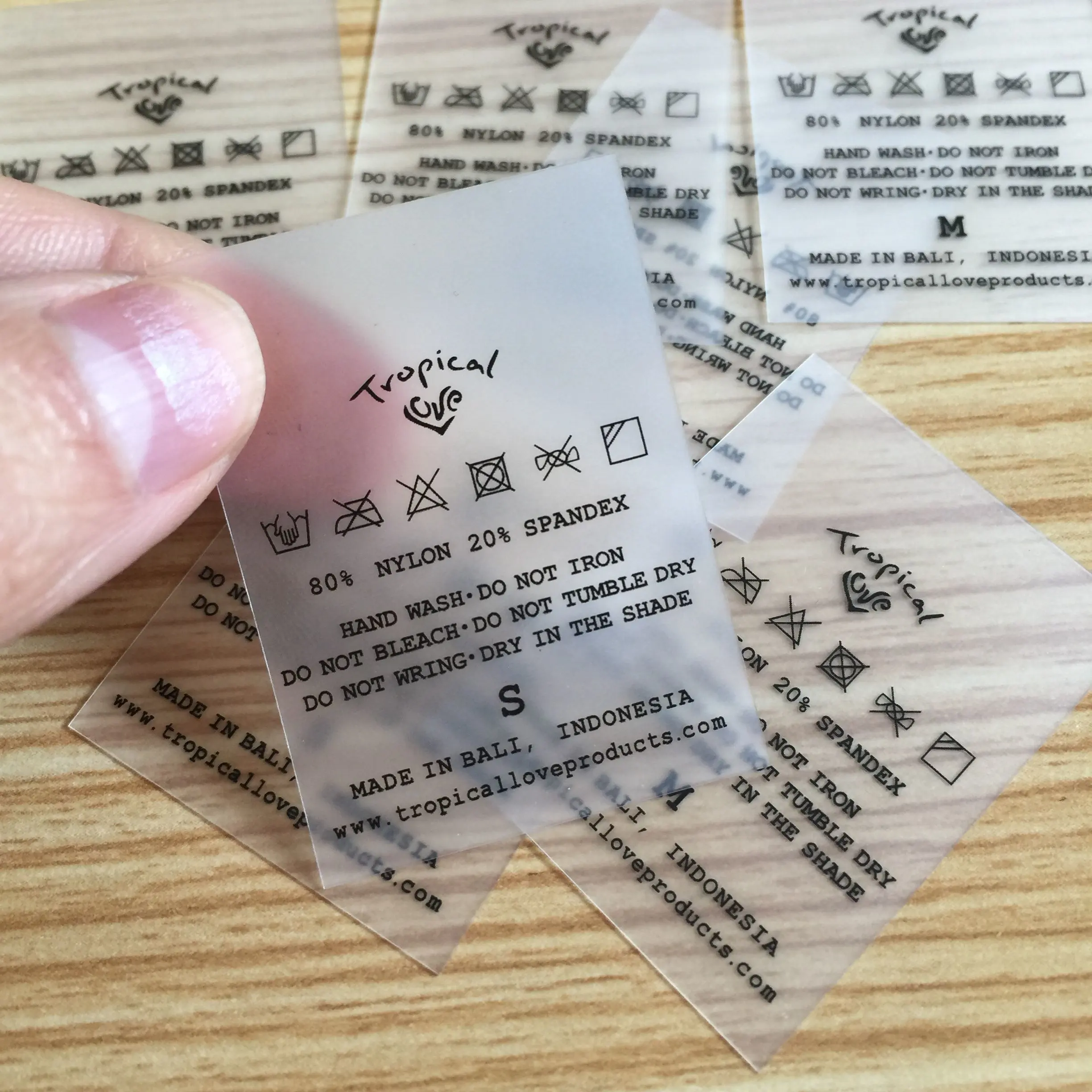 Stampati personalizzati morbido impermeabile abbigliamento abbigliamento costumi da bagno trasparente chiaro caso di tpu etichette di cura di lavaggio