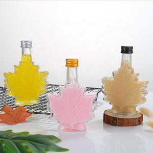Tùy chỉnh thực hiện Maple Leaf Shape Glass uống chai với vít nắp cho máy ép trái cây rượu uống Glass Container 50ml <span class=keywords><strong>100ml</strong></span> 250ml - Product Image 1