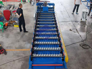 เครื่องขึ้นรูปม้วนแผ่นแบบสี่เหลี่ยมคางหมูเครื่องขึ้นรูปหลังคาโลหะแผ่นสี่เหลี่ยมคางหมู - Product Image 6