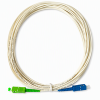 Kabel Patch Fiber Optik Singlemode 9/125 G.657.A2 SC/APC Hijau ke SC/UPC Biru 2.0mm Putih OFNR untuk FTTH PON