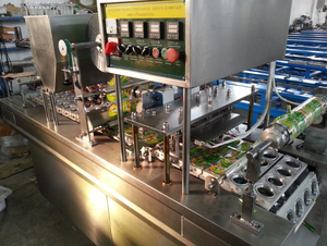 Machine de remplissage et de scellage automatique WANHE pour gobelets et sachets <span class=keywords><strong>en</strong></span> plastique de 200 ml, pour l'emballage de boissons et d'huiles - Product Image 6