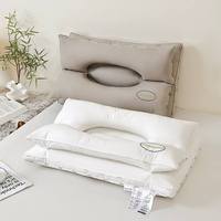 Oreiller de massage par traction pour la colonne cervicale avec tissu confortable et protection des oreilles pour adultes dormant sur le côté