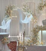 ¡Venta al por mayor! Alas de mariposa brillantes, soporte de luz LED de plomo para carretera, escenario de fondo para diseño de escena de boda, lámparas