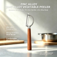 Éplucheur de cuisine manuel en alliage de zinc, lame en acier inoxydable, manche en bois, outil multifonction pour éplucher les légumes et les fruits, passe au lave-vaisselle