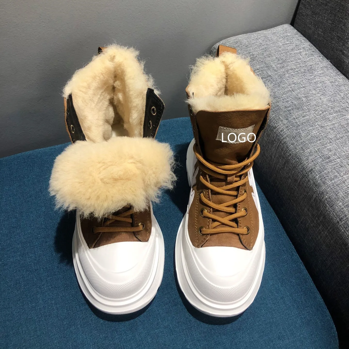 Venta al por mayor de moda una piel pelusa corta botas de nieve de invierno tobillo zapatos de mujer vendaje niñas señora botas