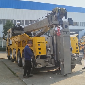 Exportation de camions lourds Sinotruk 8X4 du Moyen-Orient avec grue montée sur camion et grue rotative hydraulique pour le dépannage de camions - Product Image 5