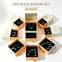 Boîte à bijoux en velours avec logo personnalisé pour bagues, boucles d'oreilles, colliers, présentoir de magasin, vente en gros