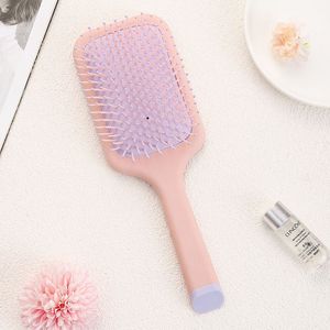 Brosse à cheveux coussinée noire mate à poils en nylon, forme oblongue, pour cheveux raides et massage capillaire - Product Image 4