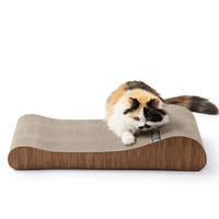 Griffoir pour chat incurvé en gros avec jouet à bille intégré, mobilier griffoir en carton ondulé OEM/ODM