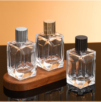 Flacon de parfum en verre facetté de 100 ml avec bouchon en alliage de zinc bronze foncé, finition givrée, pulvérisateur à pompe, ensemble cadeau vide comprenant boîte et sac