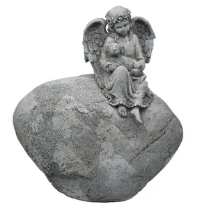Resin Sculpture Of An Angel Holding A Dog Sitting On A Stone Indoor Decoration
