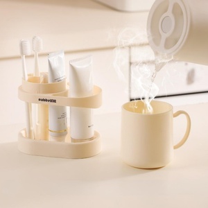 Estuche portátil de plástico para pasta de dientes con asa, vaso de viaje para cepillo de dientes y vaso para ungüento, set de baño - Product Image 1