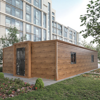 Bungalow en bois préfabriqué extensible de 40 pieds Chalet en bois Bureau Cuisine Panneau sandwich Construction Carport
