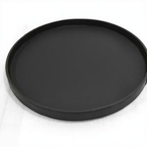 Bandeja redonda clásica negra con diseño de piel sintética - Product Image 1