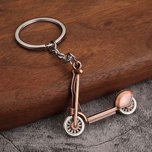 Nouveau porte-clés en métal en forme de scooter électrique 3D personnalisé avec logo de voiture, vente en gros - Product Image 4