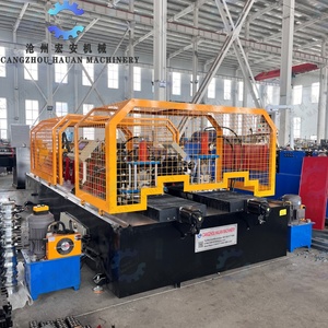 เครื่องขึ้นรูปเหล็กสีอัตโนมัติรุ่นใหม่ของ Hauan สำหรับงานก่อสร้างรางประตูม้วนเหล็ก พร้อมการรับประกัน 2 ปี - Product Image 3