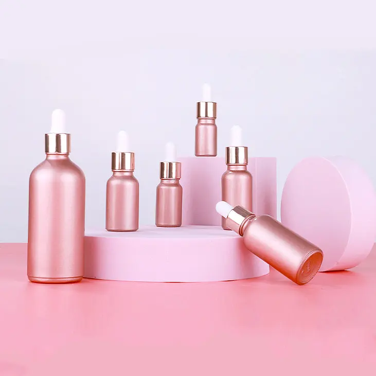 Unique 15ml 30ml 50ml Glass Flacon Huile Essentielle Skin Care Oil Pink Rose Gold Dropper Bottle with Gold Ring Lid