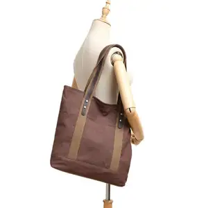 大容量シンプルな女性のつま先バッグカスタマイズされたロゴキャンバスイブニングハンドバッグはバッグに入れるべきです