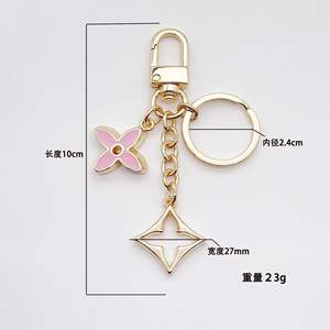 थोक फैशन फूल आकर्षण घड़ी सुंदर श्रृंखला डिजाइन स्टेनलेस स्टील कीचेन - Product Image 2