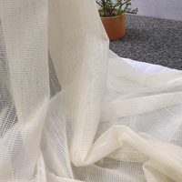 Tissu pour rideaux blancs en voile de polyester jacquard tricoté pour l'hôtellerie