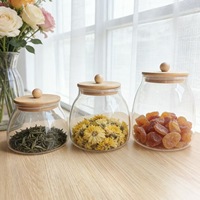Driehoekige theebus van helder borosilicaatglas met bamboe deksel met bolvormige knop voor geurende thee, granen, voedselveilige container