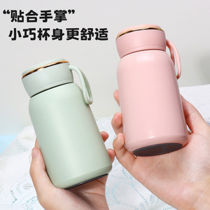 Bouteille d'eau isotherme en acier inoxydable 316 rose, mini-gobelet de voyage portable avec poignée et base en silicone, design rond - Product Image 5