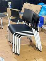Chaise empilable à accoudoirs en plastique PP pour salle à manger, hôtel, réunion