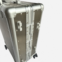 Valise à roulettes rigide ultra-légère en alliage de titane et d'aluminium de qualité OEM pour les acheteurs de marques de luxe