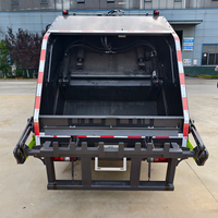 Camion à ordures compacteur Isuzu 4X2 5m³ à benne basculante, personnalisation pour le commerce extérieur